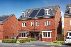 Exterior view of a modern semi-detached brick house with solar panels on the roof, representing a typical suburban UK residential property suitable for home soundproofing solutions.